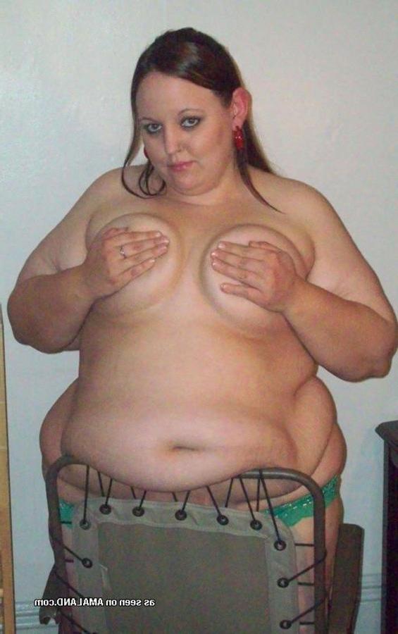 10P Gallery of a BBW with a big belly posing for the camera