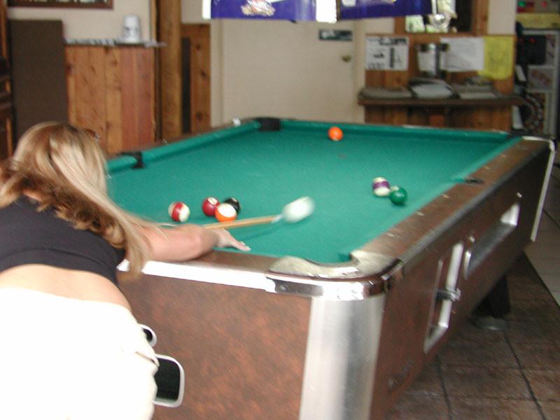 20P Blond with ripe knockers playing pick-up pool.