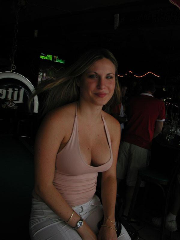 20P Blond with ripe knockers playing pick-up pool.