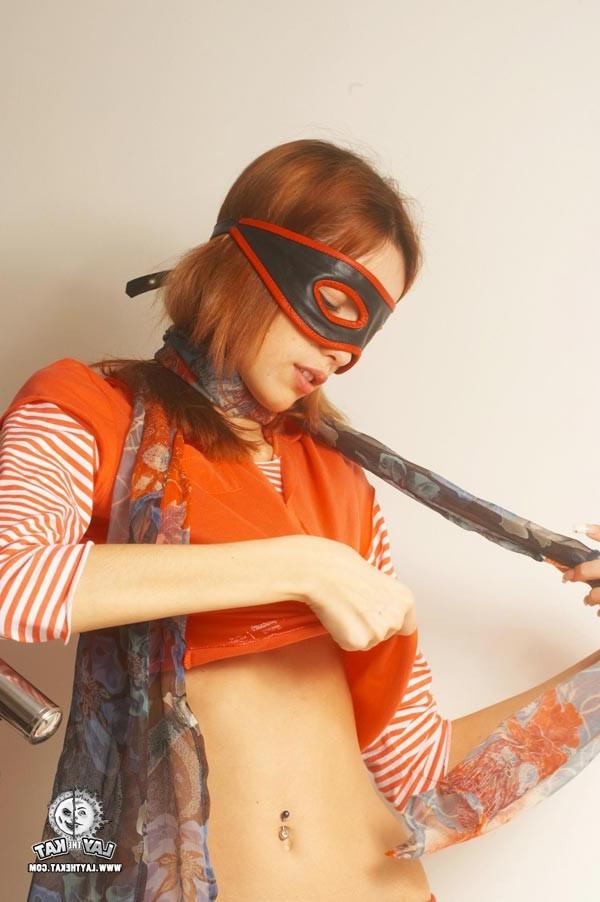 15P Young masked redhead teen stripping