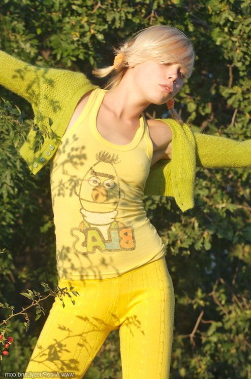 15P Charming blonde teen naked in nature