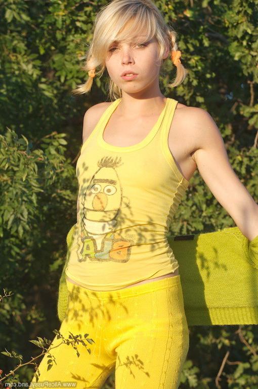 15P Charming blonde teen naked in nature