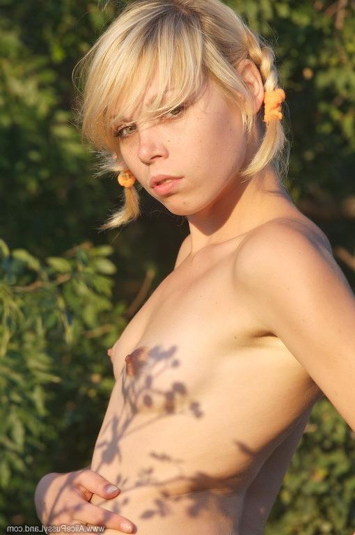 15P Charming blonde teen naked in nature