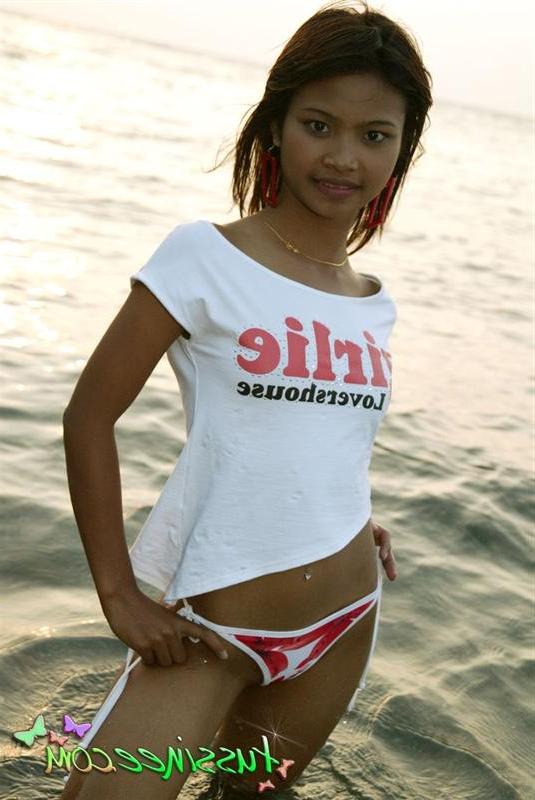15P Tiny teen Thai girl takes a swim in the Gulf of Thailand