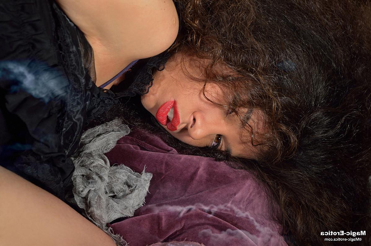 14P Brunette babe toying her holes with a cucumber in Halloween nigh