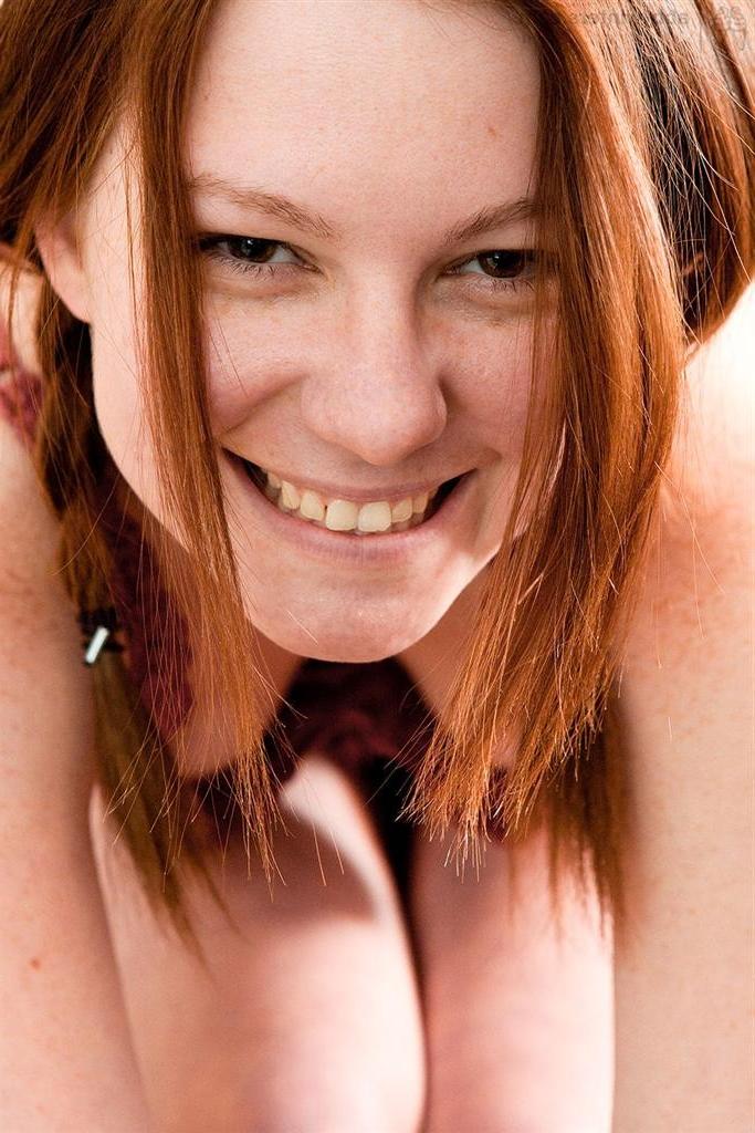 16P Real amateur redhead teen stripping out of her bra and panties