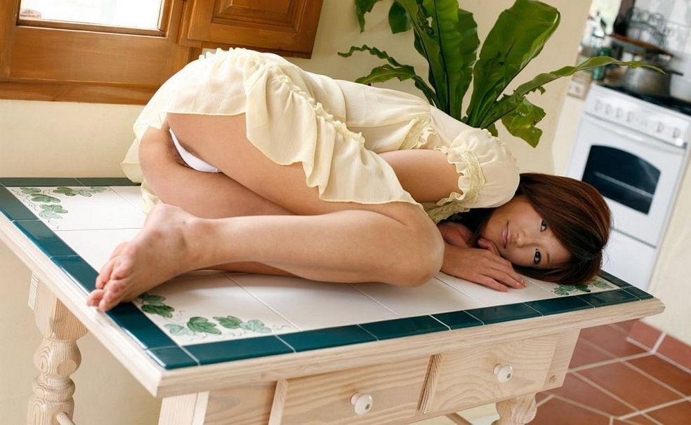 15P Asian beauty Yu Saotome poses on kitchen shows ass
