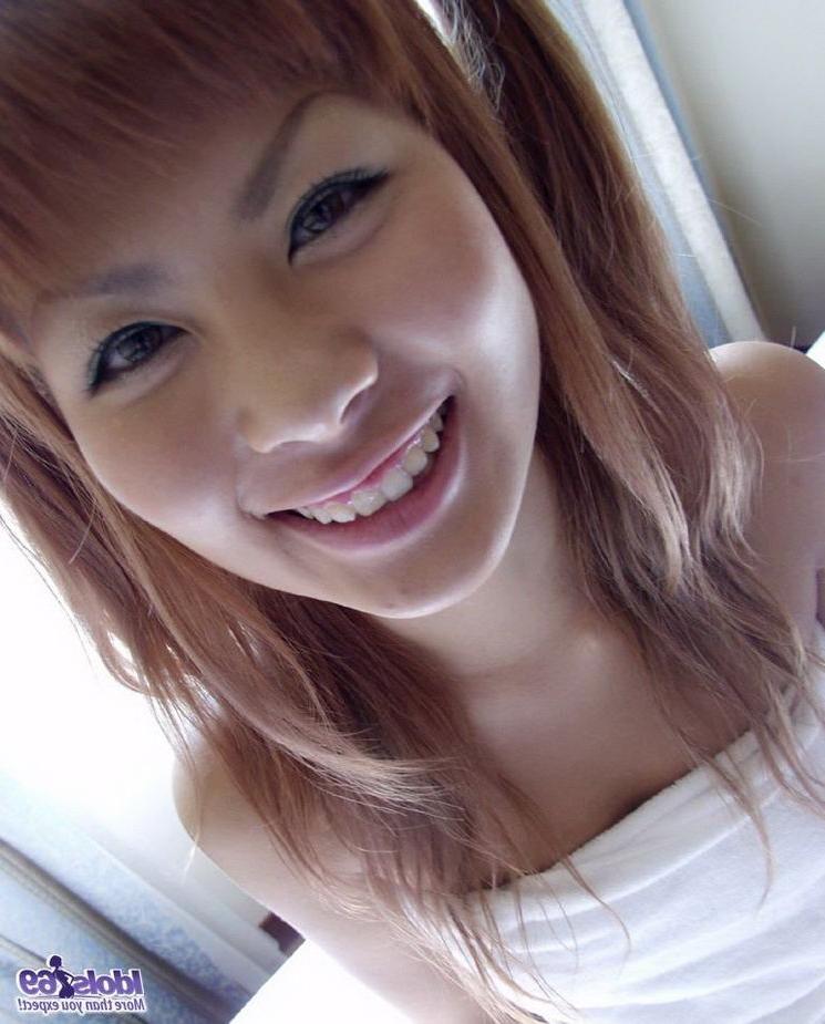 15P Cute japanese teen Aki taking shower washing pussy