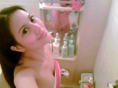 15P Asian teen girlfriends posing for the camera