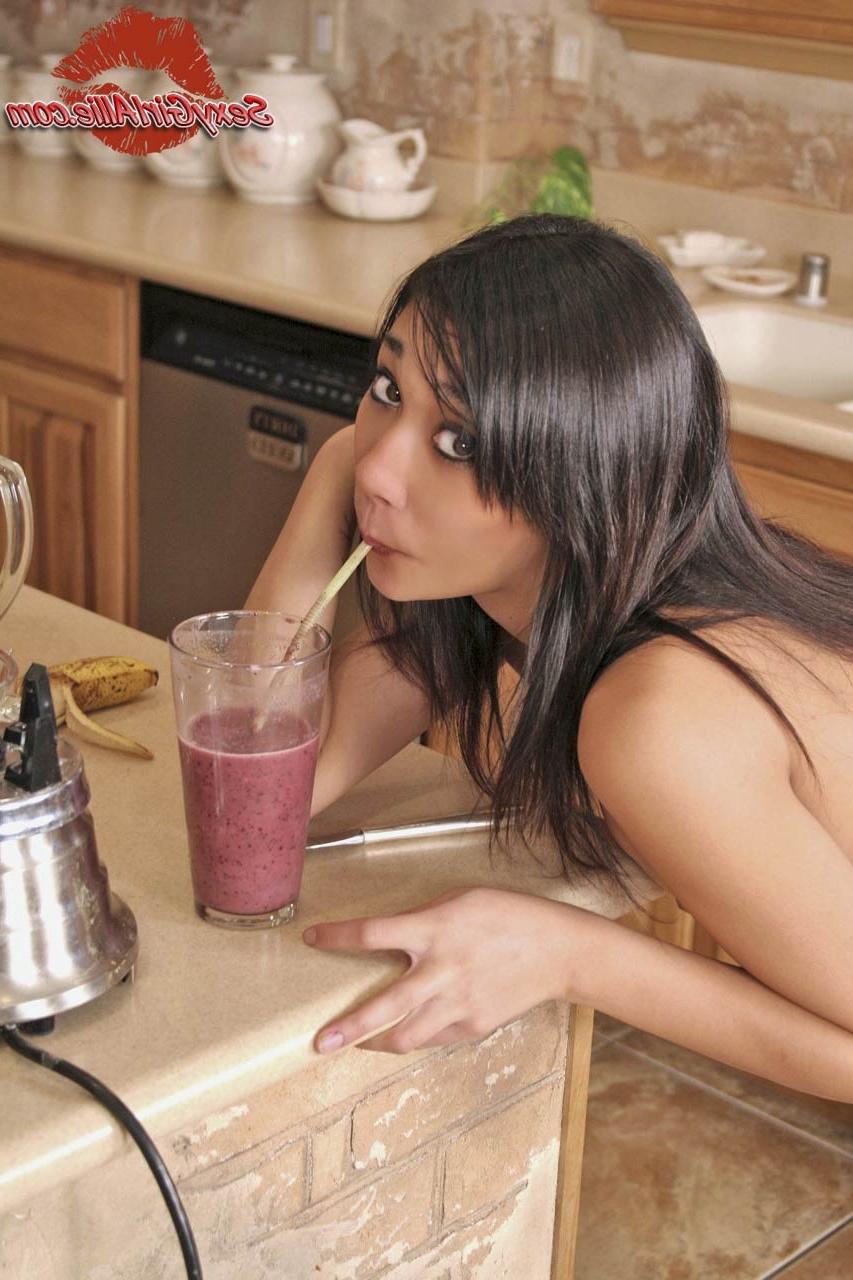 16P Skinny asian teen girl cooking