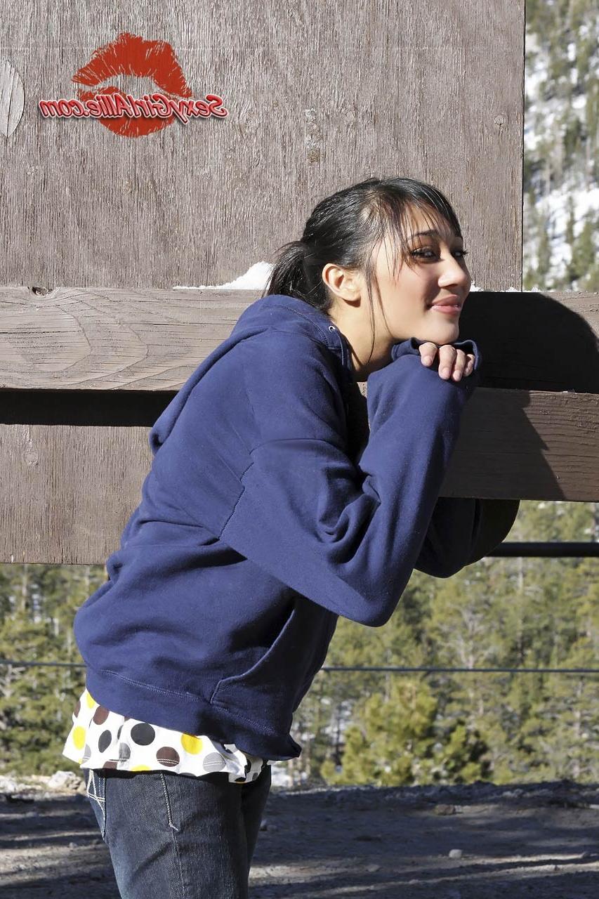16P Skinny asian teen girl outdoors
