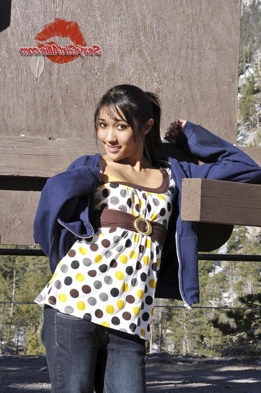 16P Skinny asian teen girl outdoors