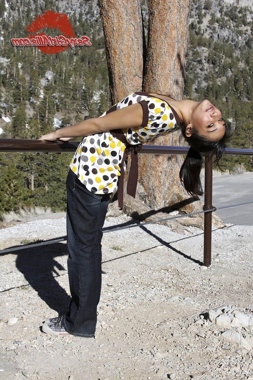 16P Skinny asian teen girl outdoors