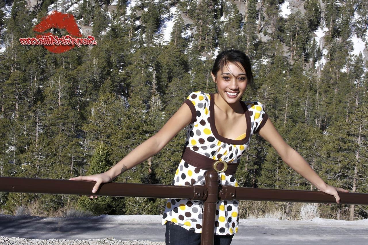 16P Skinny asian teen girl outdoors