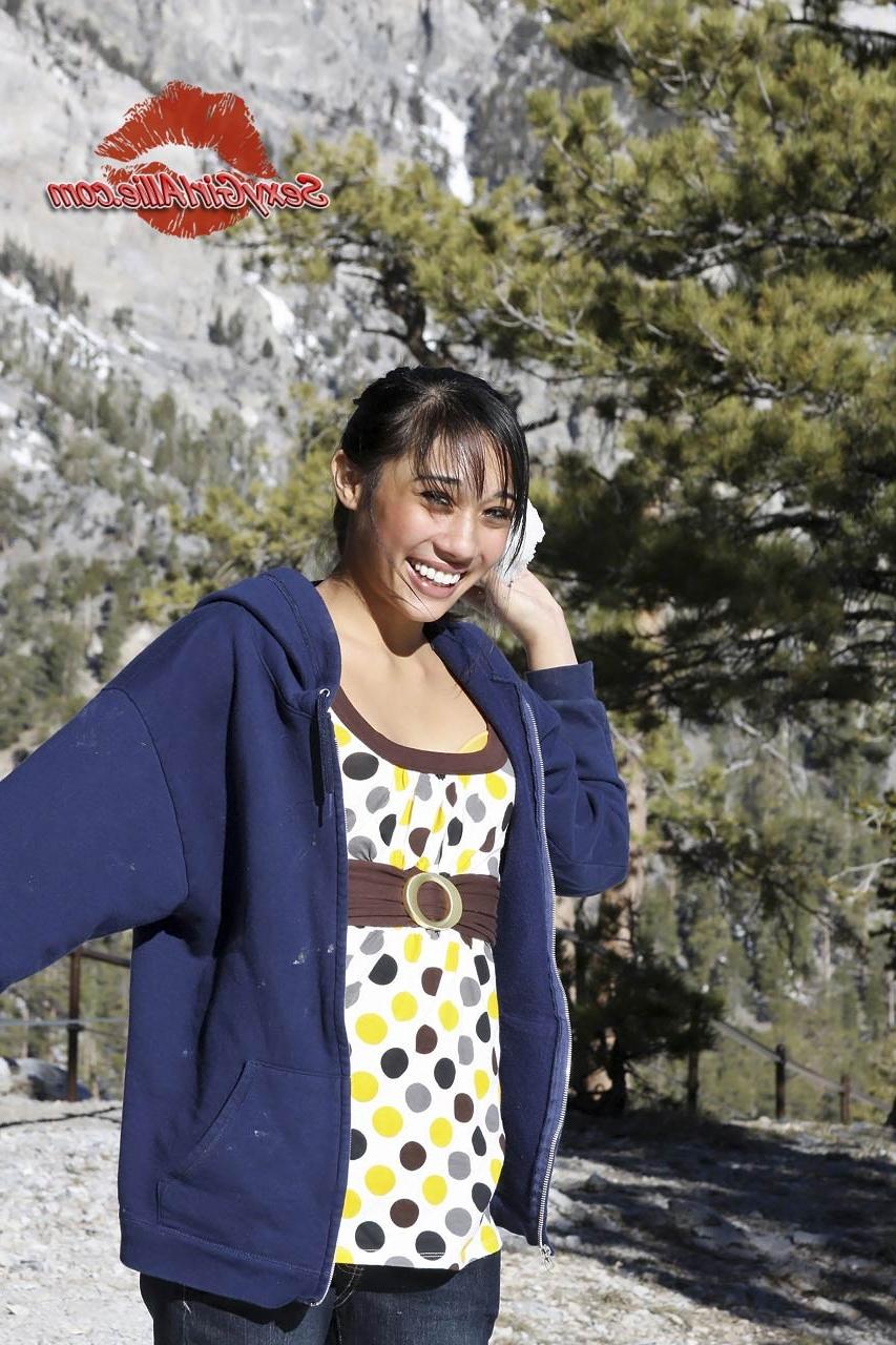 16P Skinny asian teen girl outdoors