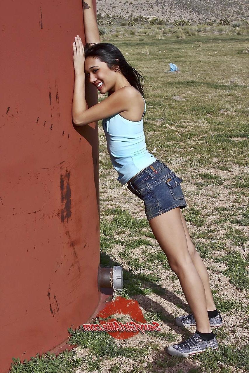 11P Skinny asian teen girl tease outdoors