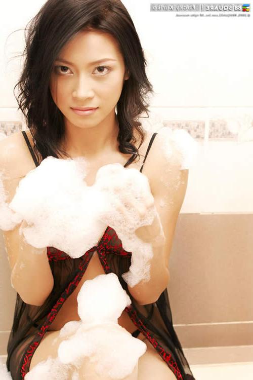 15P Asian babe showering in sexy lingerie