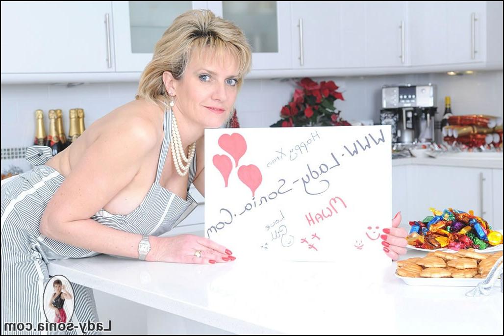 15P Xmas preparations in seamed nylons in mature lady sonias kitchen