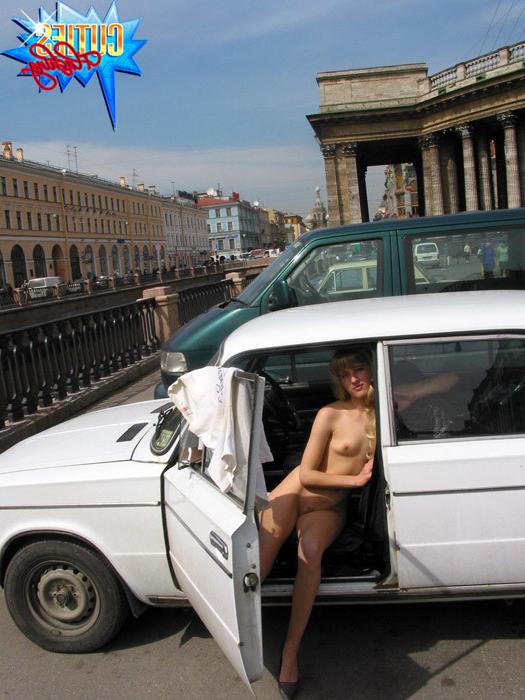 16P Shameless blonde bitch rubs her pussy in public