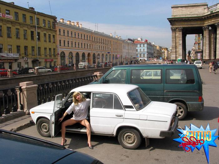 16P Shameless blonde bitch rubs her pussy in public