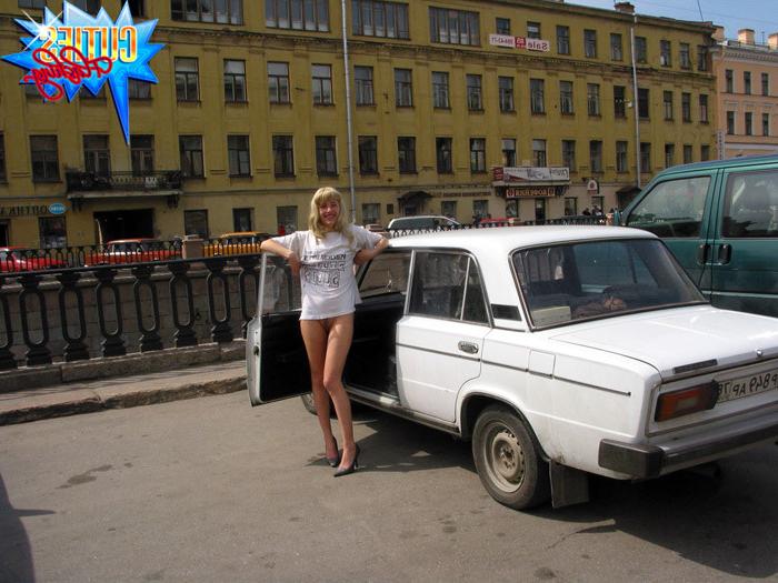 16P Shameless blonde bitch rubs her pussy in public