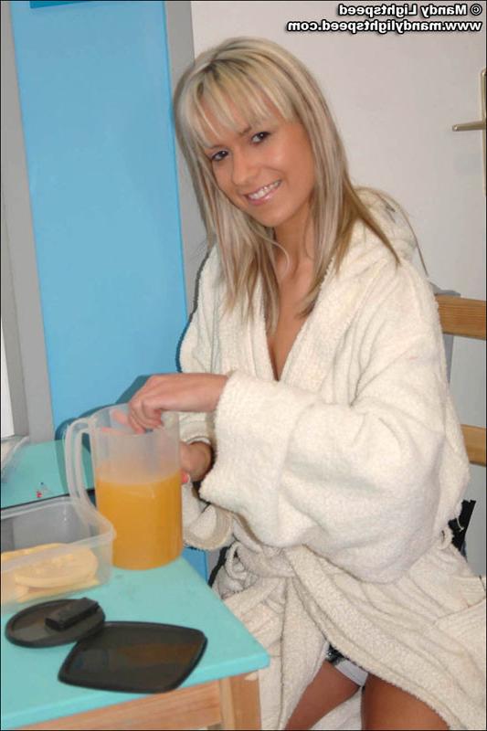 15P Mandy Lightspeed fools around in the kitchen