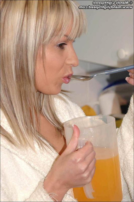 15P Mandy Lightspeed fools around in the kitchen