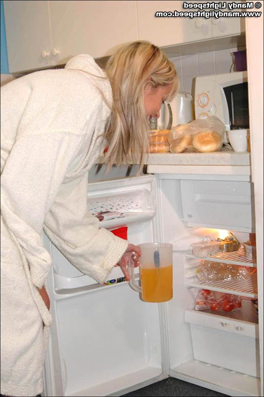 15P Mandy Lightspeed fools around in the kitchen