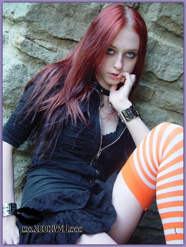 15P Hot gothic babe Liz plays with a pumpkin