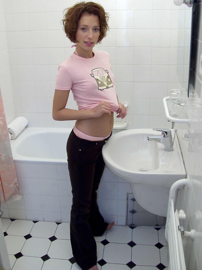18P Cute teen with tiny tits playing in her bathtub