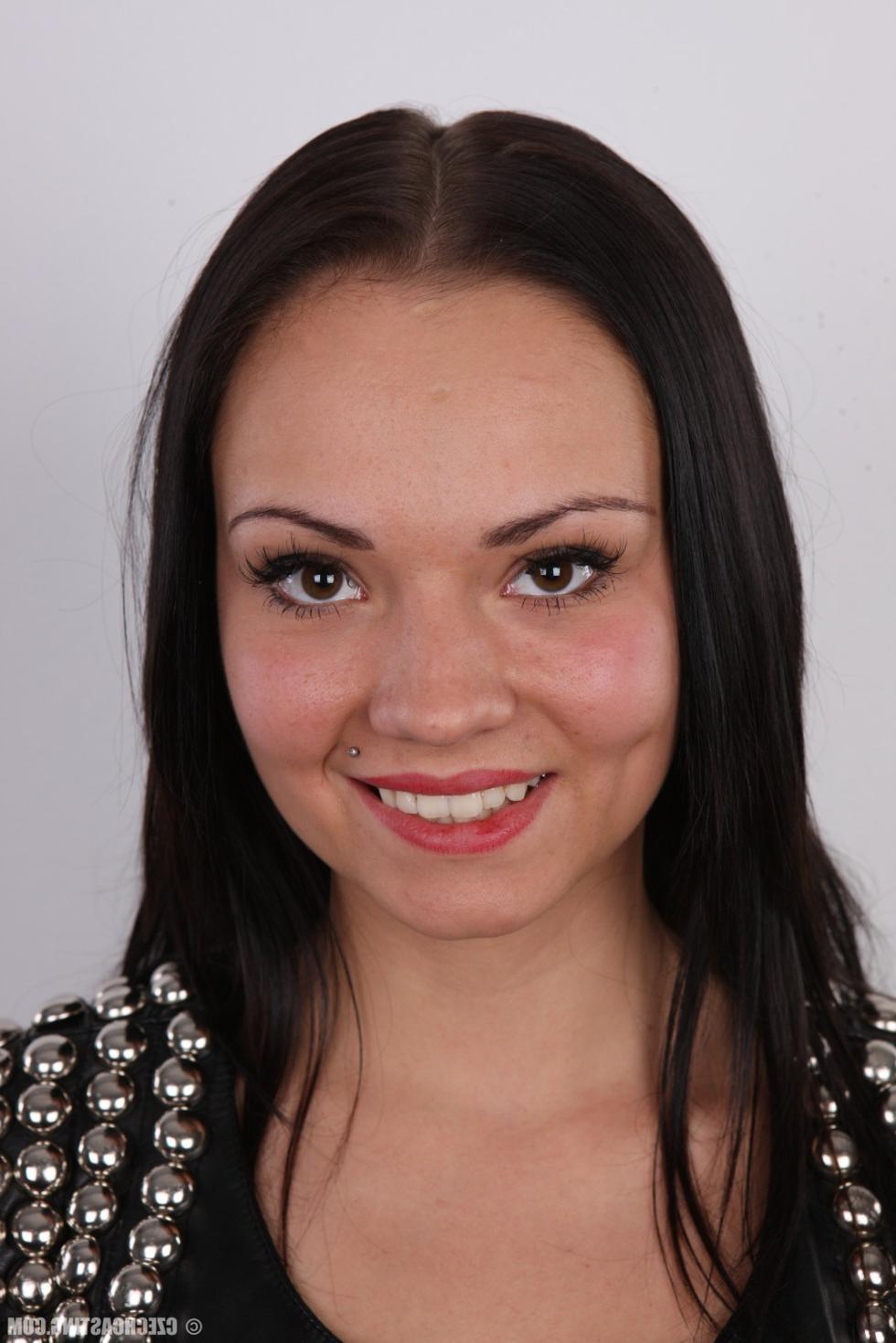 15P Petite brunette poses naked