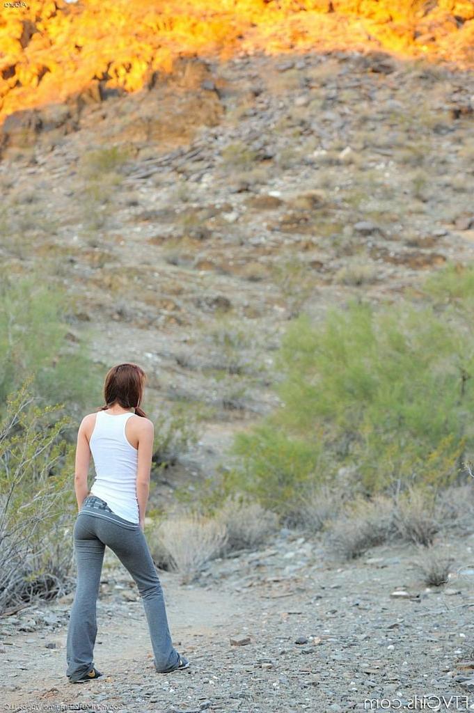 15P Cute teen in pigtails strips nude on a nature hike