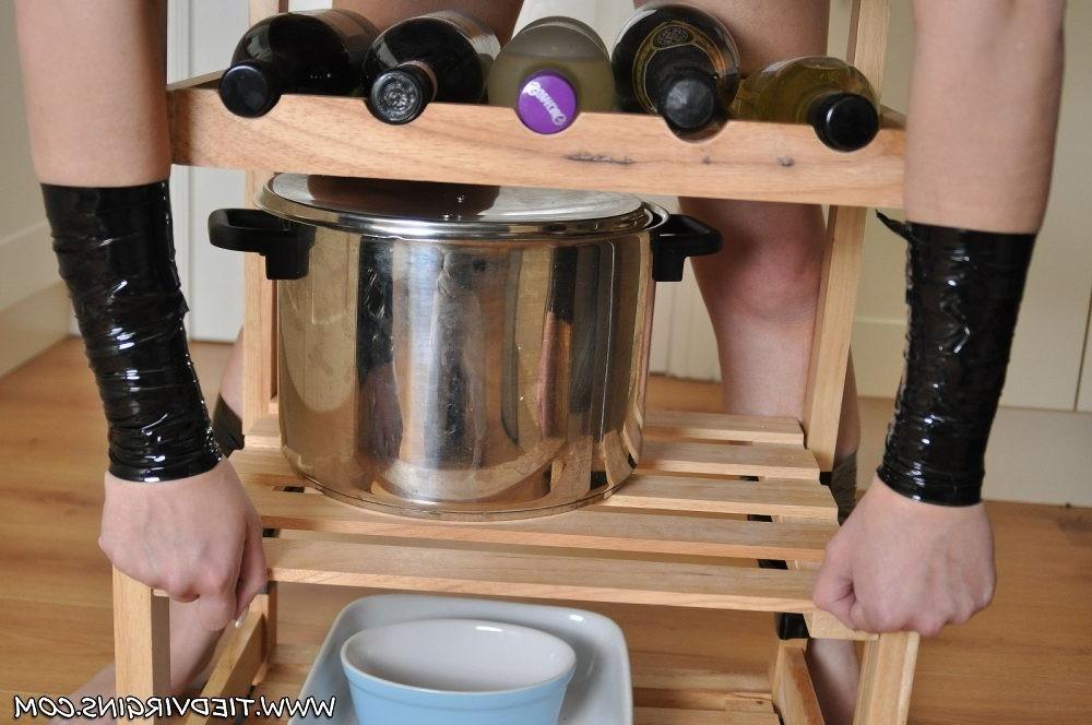 12P Slut has been a bad girl so is restrained in the kitchen