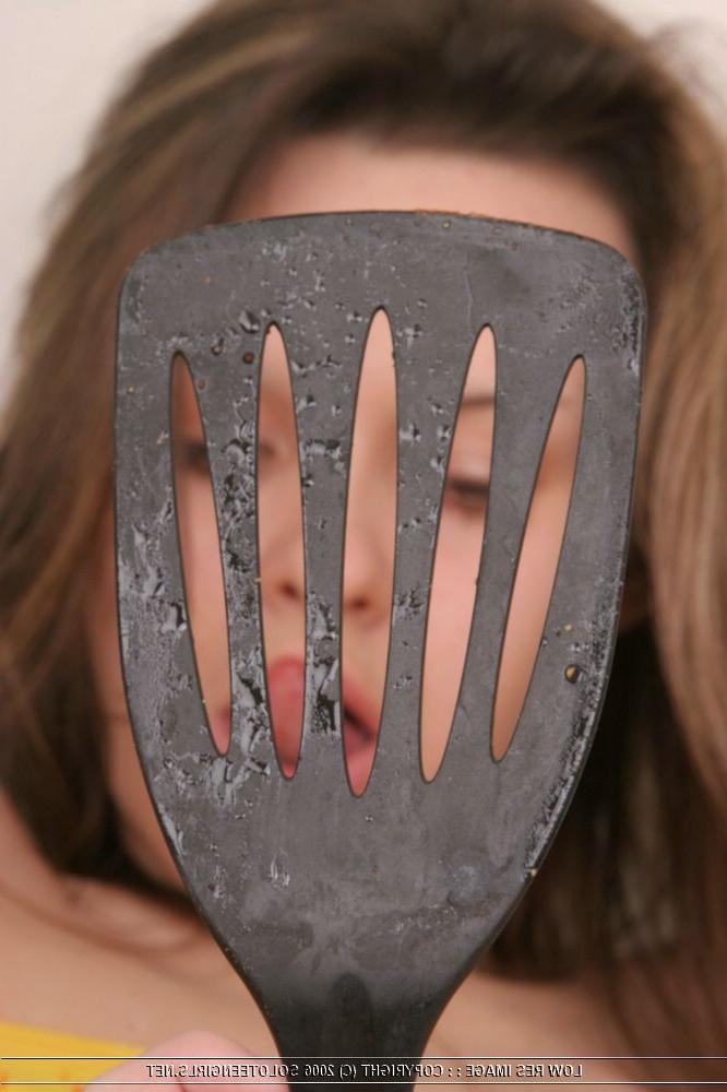 15P Teeny uses kitchen tool as a dildo