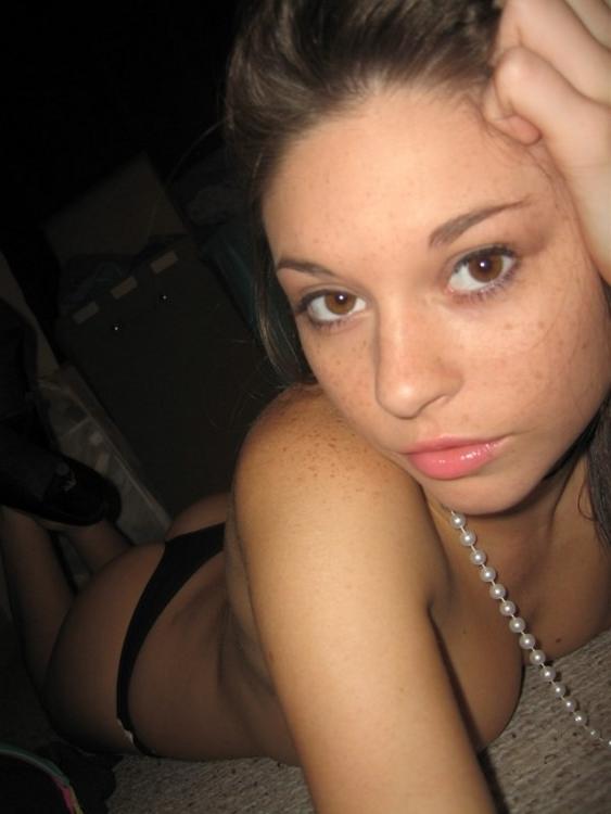 15P Gorgeous blonde teen with small tits posing on camera naked