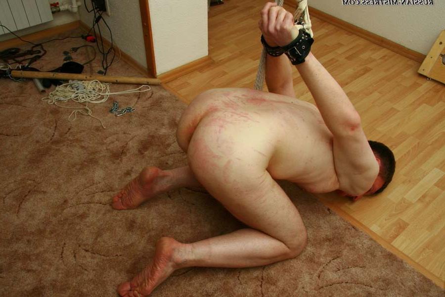 16P Submissive vanilla-skinned lad bends down letting his mistress test her new stra