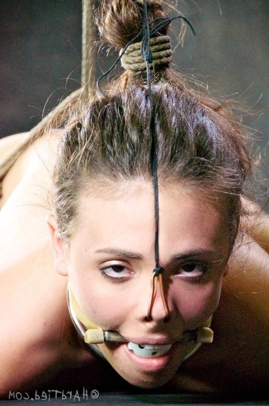 16P Casey Calvert is bound in rope with nipple clamps