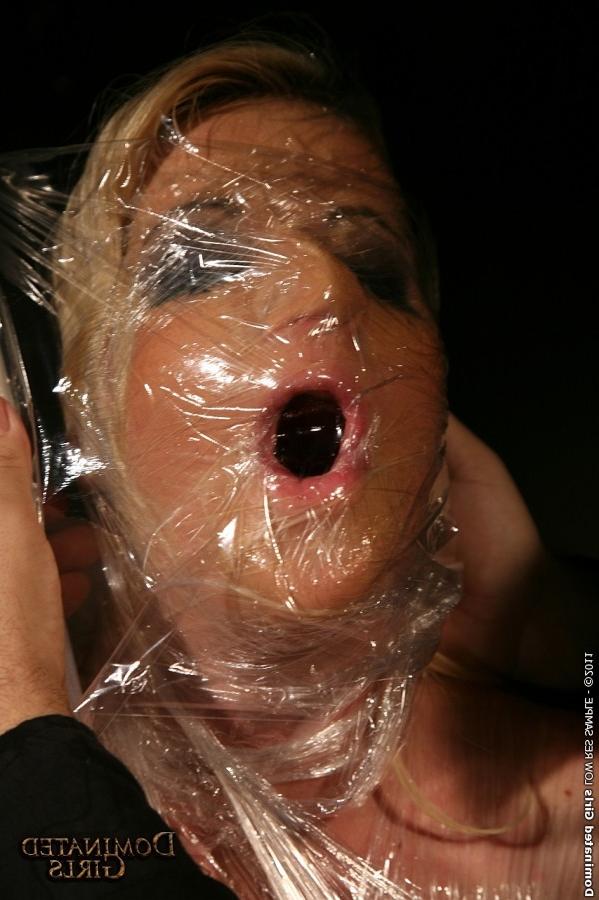 12P The creative master wrapped Anita Blue in plastic