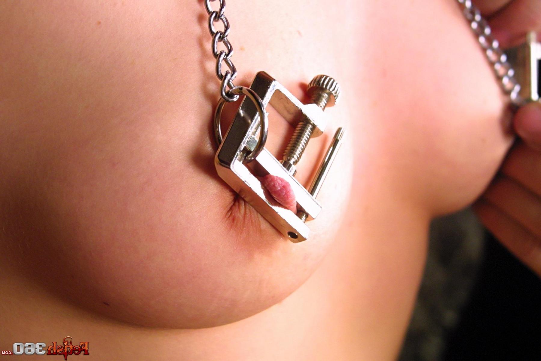 12P redheaded whore gets tits and pussy clamped 
