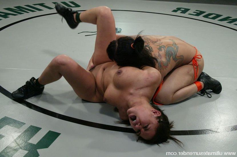 15P Asian beauty gets her asses kicked in F/F nude wrestling.