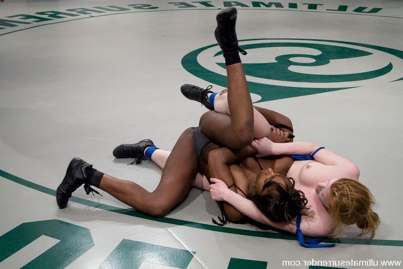 15P Black girl crushes little red head in all nude wrestling.