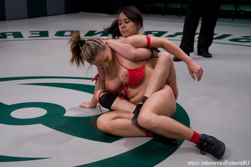 15P Hot Asain beats busty blond in non scripted nude wreslting.