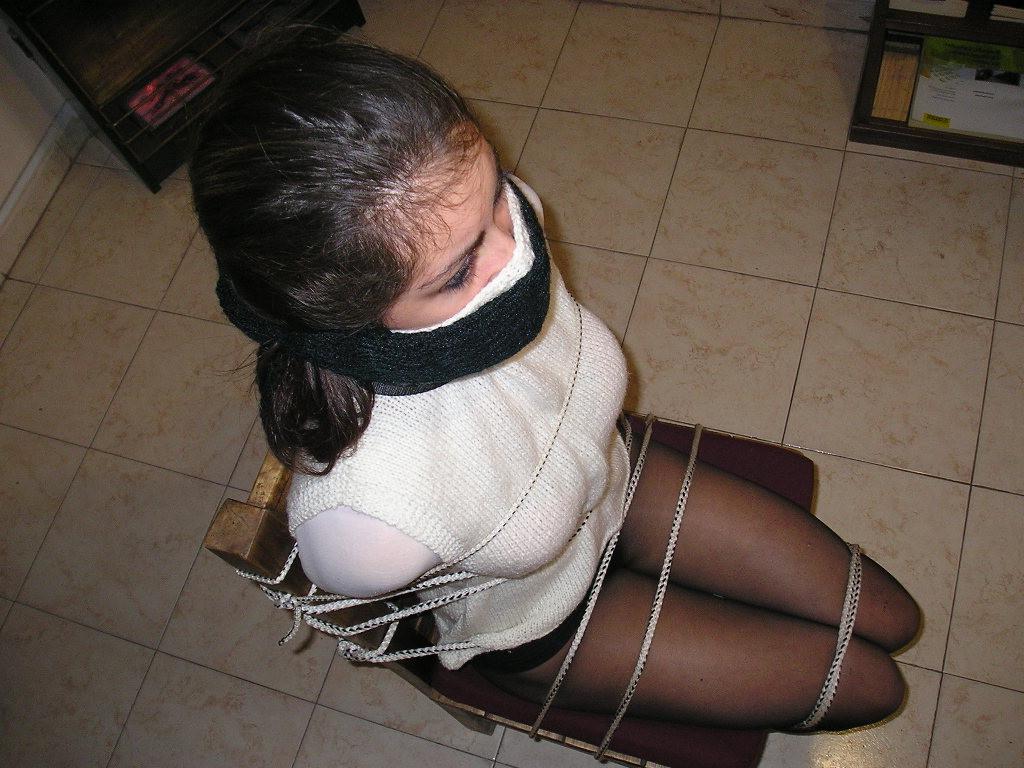 12P Young college girl tied down to a chair