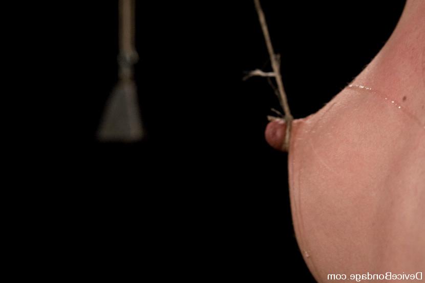 15P Suspended slave babe Dana DeArmond gets breasts bondage