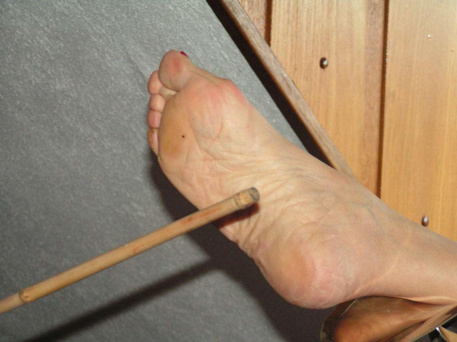 16P Lesbian mistress in extreme bastinado and foot spanking of her bound slavegirl