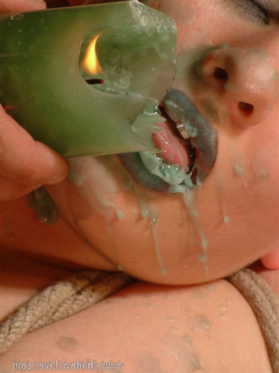 15P Blonde slave in bondage and covered in candle wax