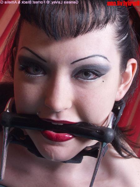 15P Sexy tied up goth girl spreads her legs