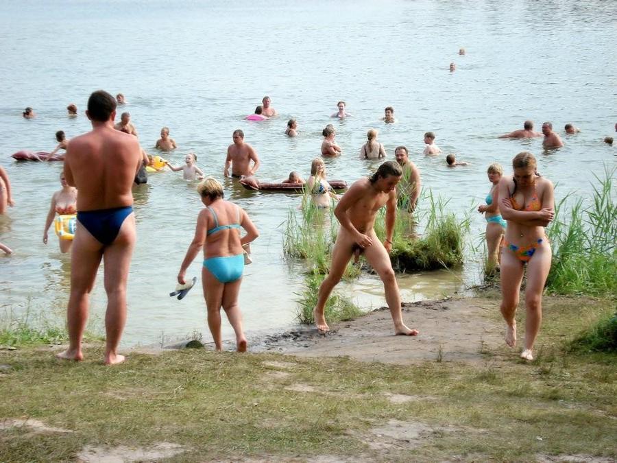 15P Gorgeous blonde Russian nudist sunbathes naked