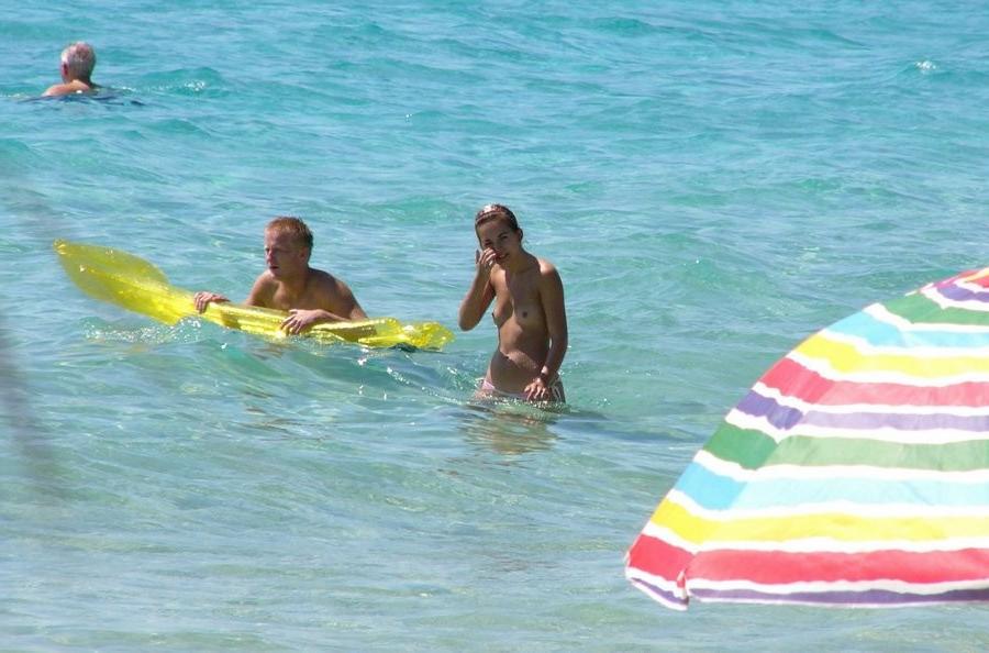 15P Gorgeous blonde Russian nudist sunbathes naked