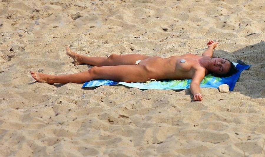 15P Gorgeous blonde Russian nudist sunbathes naked